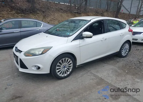 2012 Ford Focus Titanium z USA, uszkodzony, nr VIN 1FAHP3N26CL183004